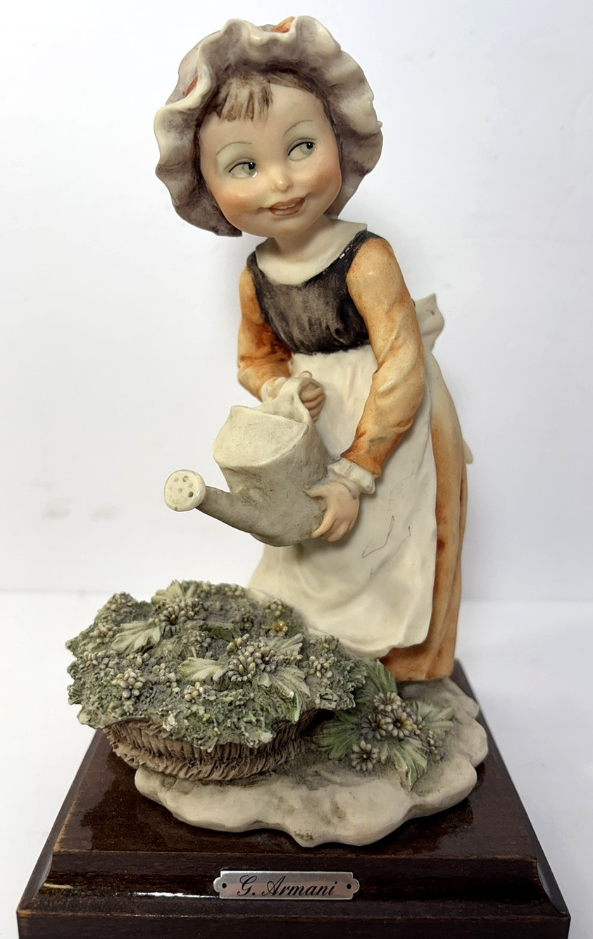 Giuseppe Armani Signed Girl Watering Plants Figurine, Gulliver’s World Italy, 8"